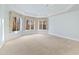 Bright bedroom with carpeted floor, bay windows and ceiling fan at 1313 Enderbury Dr, Raleigh, NC 27614