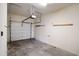 Spacious garage with automatic door opener and storage racks at 1313 Enderbury Dr, Raleigh, NC 27614