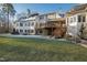 Back of house with large deck and yard at 1313 Enderbury Dr, Raleigh, NC 27614