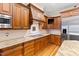 Modern kitchen featuring granite countertops and stainless steel appliances at 1313 Enderbury Dr, Raleigh, NC 27614