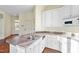 Modern kitchen with white cabinets, double sink, and ample counter space at 1313 Enderbury Dr, Raleigh, NC 27614