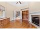 Spacious library with built-in shelving and fireplace at 1313 Enderbury Dr, Raleigh, NC 27614