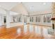 Bright living room with hardwood floors, high ceilings and fireplace at 1313 Enderbury Dr, Raleigh, NC 27614