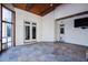Screened porch with tile flooring, French doors and access to backyard at 1313 Enderbury Dr, Raleigh, NC 27614