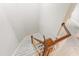 Elegant wooden staircase with carpeted steps leading to upper level at 1313 Enderbury Dr, Raleigh, NC 27614