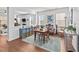 Formal dining area with hardwood floors and a vintage-style table at 1617 Old Bramble Ln, Fuquay Varina, NC 27526