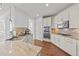 Well-equipped kitchen with double ovens and granite countertops at 1617 Old Bramble Ln, Fuquay Varina, NC 27526