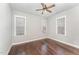 Spacious bedroom with hardwood floors and neutral walls at 172 Cotten Dr, Morrisville, NC 27560