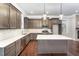 Modern kitchen with gray cabinets, white countertops, and island at 172 Cotten Dr, Morrisville, NC 27560
