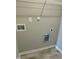 Well-appointed laundry room with washer and dryer hookups, and practical shelving at 185 N Movado Trl, Kenly, NC 27542
