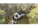 Aerial view of the home surrounded by trees at 1909 Pearces Rd, Zebulon, NC 27597