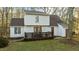 Home exterior with a spacious deck, perfect for outdoor gatherings at 1909 Pearces Rd, Zebulon, NC 27597