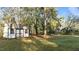Backyard with a wooden shed at 1909 Pearces Rd, Zebulon, NC 27597