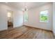 Bright bedroom with hardwood floors and an en-suite bathroom at 2011 Angier Ave, Durham, NC 27703