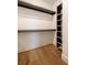 Bright closet with window, shelving, and hanging space at 2011 Angier Ave, Durham, NC 27703