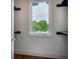 Closet with window, shelving, and hanging space at 2011 Angier Ave, Durham, NC 27703