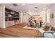 Bright dining area with hardwood floors and modern chandelier at 2011 Angier Ave, Durham, NC 27703