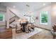 Spacious dining area with hardwood floors and modern lighting at 2011 Angier Ave, Durham, NC 27703