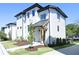 Modern two-story home with white brick exterior and landscaped lawn at 2011 Angier Ave, Durham, NC 27703