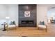 Modern fireplace with a sleek, dark tile surround at 2011 Angier Ave, Durham, NC 27703