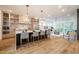Open concept kitchen features a large island with seating and stainless steel appliances at 2011 Angier Ave, Durham, NC 27703