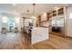 Modern kitchen with marble island, stainless steel appliances, and hardwood floors at 2011 Angier Ave, Durham, NC 27703