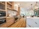 Modern kitchen with stainless steel appliances and light wood cabinets at 2011 Angier Ave, Durham, NC 27703