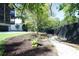 Landscaped backyard with a rock pathway and privacy fence at 2011 Angier Ave, Durham, NC 27703