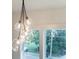 Close-up view of a unique glass globe chandelier at 2011 Angier Ave, Durham, NC 27703