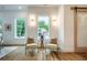 Cozy sitting area with two armchairs and a modern side table at 2011 Angier Ave, Durham, NC 27703