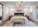 Main bedroom with king-size bed, en-suite bathroom, and private balcony at 2011 Angier Ave, Durham, NC 27703