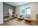 Bright home office with built-in desk and hardwood floors at 2011 Angier Ave, Durham, NC 27703