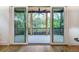 Relaxing screened porch with ceiling fan and wooded views at 2011 Angier Ave, Durham, NC 27703