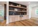 Stylish wet bar featuring a concrete sink and wooden cabinetry at 2011 Angier Ave, Durham, NC 27703