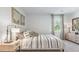 Spacious bedroom with large window and stylish decor at 2180 Monk Dr, Haw River, NC 27258
