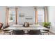 Modern dining room with hardwood floors and large windows at 2180 Monk Dr, Haw River, NC 27258