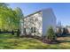 Landscaped backyard with trees and privacy at 2184 Monk Dr, Haw River, NC 27258