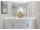 Bathroom with double vanity and large mirror, offering ample counter space at 2184 Monk Dr, Haw River, NC 27258