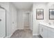 Modern bathroom with double vanity, a walk-in shower, and gray flooring at 2184 Monk Dr, Haw River, NC 27258