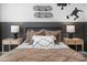 Modern bedroom with a bed, nightstands, and fun decor at 2184 Monk Dr, Haw River, NC 27258