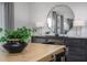 Dining area with wood table, black chairs and stylish decor at 2184 Monk Dr, Haw River, NC 27258
