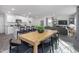Open concept dining room with kitchen and living room views at 2184 Monk Dr, Haw River, NC 27258
