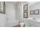 Clean bathroom with tub shower and updated vanity at 2188 Monk Dr, Haw River, NC 27258