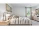 Spacious bedroom with large window and stylish decor at 2188 Monk Dr, Haw River, NC 27258