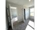 Neutral bedroom with gray carpet, a window, and white doors at 25 Calabria Ct, Franklinton, NC 27525