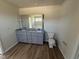 Double vanity bathroom with granite countertop at 25 Harvest Hills Ln, Dunn, NC 28334