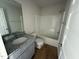 Small bathroom with granite vanity and tub shower combo at 25 Harvest Hills Ln, Dunn, NC 28334