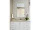 Bathroom features a stylish vanity with diamond patterned tile, ample counter space, and modern fixtures at 2721 Sanctuary Woods Ln, Raleigh, NC 27606