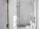 Bright bathroom with a glass-enclosed shower and stylish fixtures at 2721 Sanctuary Woods Ln, Raleigh, NC 27606