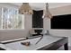 Entertaining game room with pool table and stylish lighting, great for Gathering fun and gatherings at 2721 Sanctuary Woods Ln, Raleigh, NC 27606